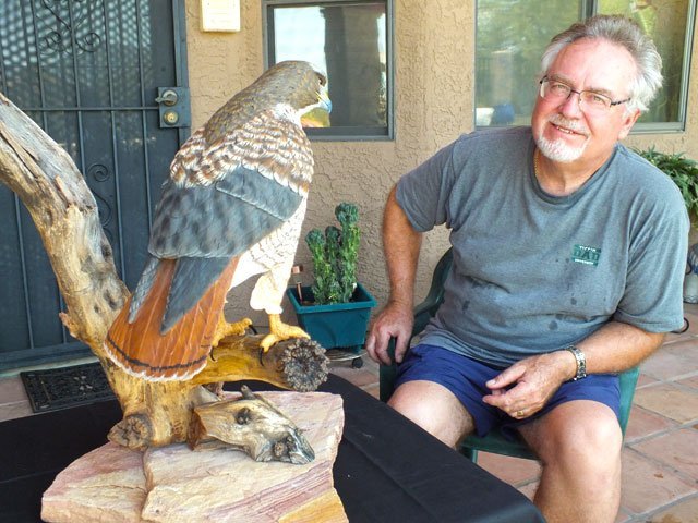 Rob Arnberger with Red Tailed-Hawk carving